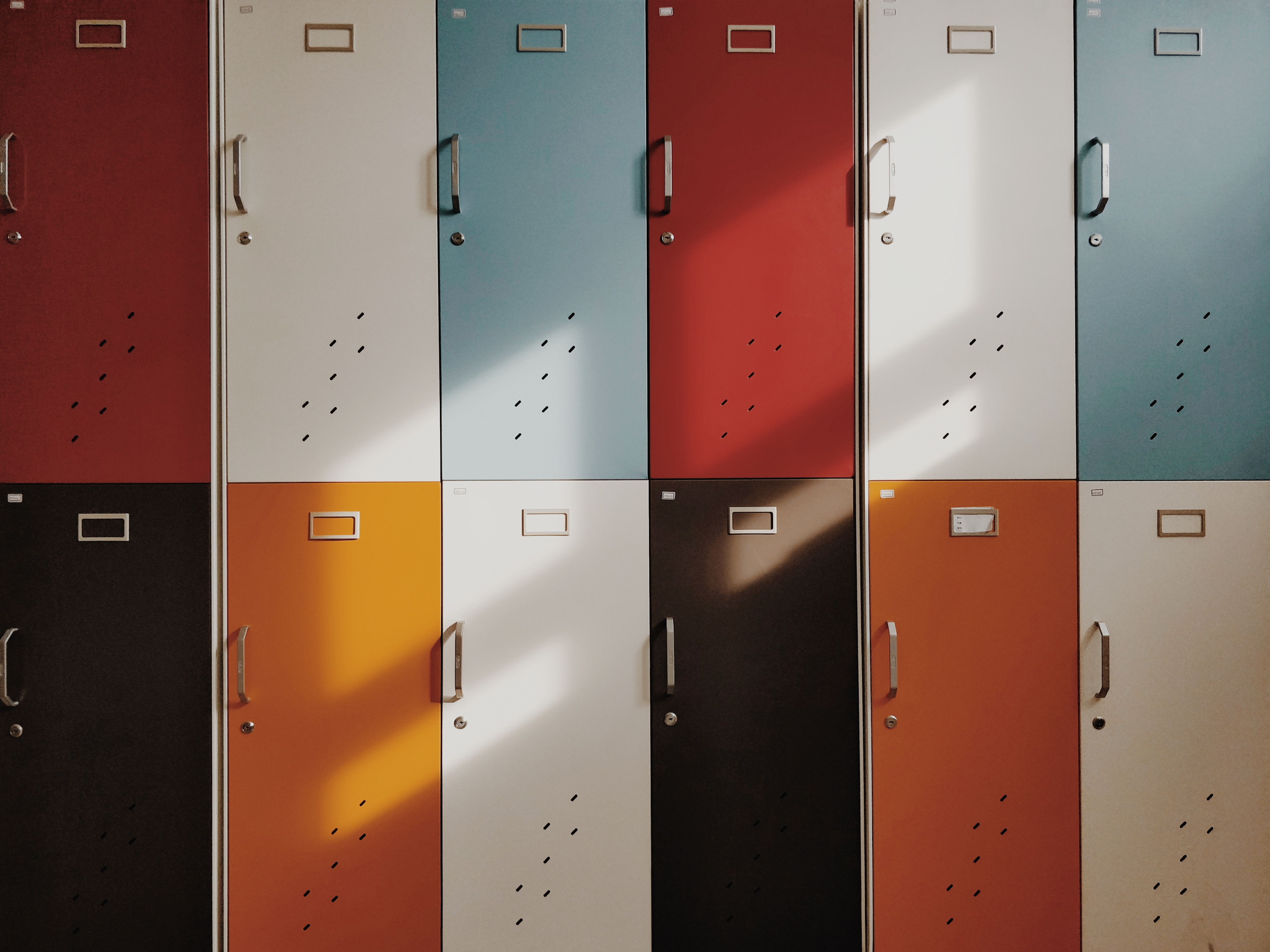 multiple coloured school lockers red blue white black